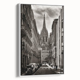 Vintage poster art of Barcelona scenery in vibrant colors on a large framed canvas, ideal for living room decor.