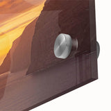 Large abstract wall art featuring vibrant hues of blue and orange on acrylic glass.