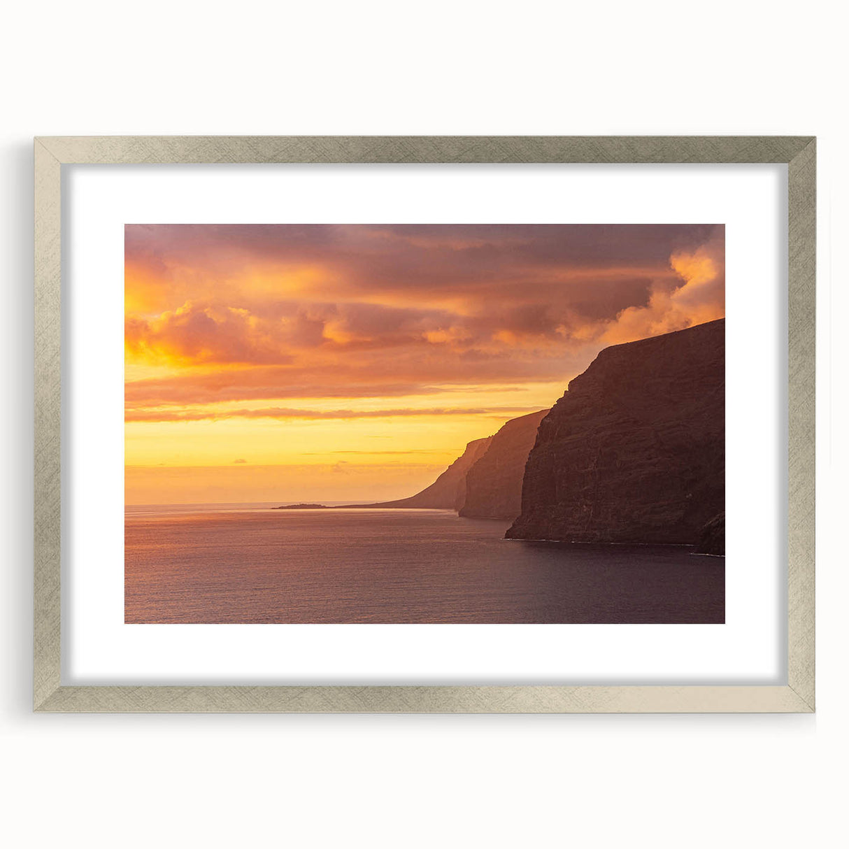 Extra large abstract art print of a textured European scenery in muted earth tones, framed in silver.