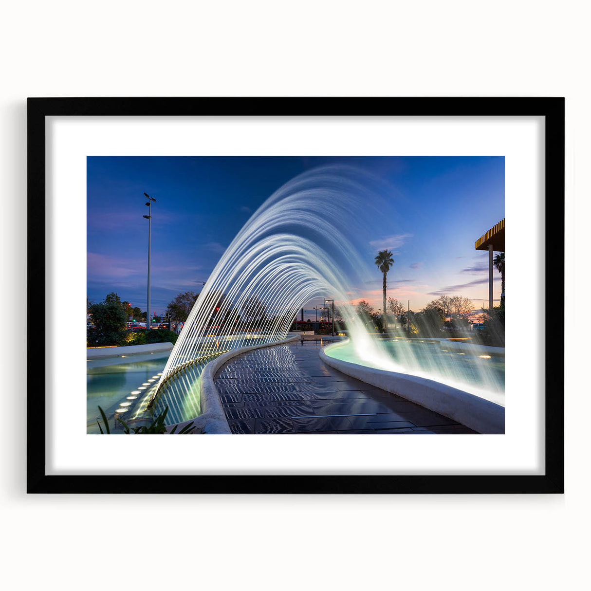 Extra large abstract art print of Valencia scenery in colorful, textured style on a black framed mat.