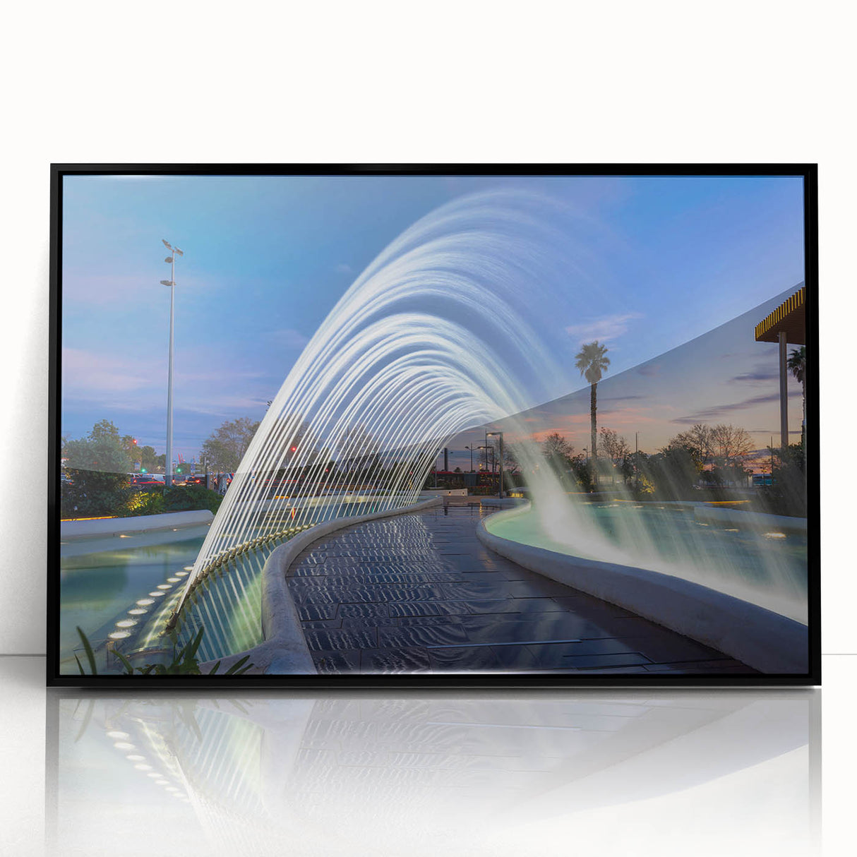 Large abstract wall art depicting a vibrant, colorful Valencia cityscape on black-framed acrylic.