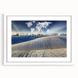 Abstract art print of a European landscape in muted earth tones on a white-framed canvas, suitable for dining room decor.