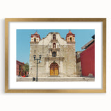 Abstract art print of Oaxaca scenery in textured style, using earthy tones, framed in gold, ideal for living room decor.