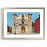 Textured abstract art print of Oaxaca scenery in muted earth tones, framed in silver, suitable for bedroom decor.