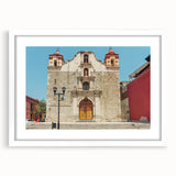 Abstract art print of Oaxaca scenery in muted earth tones on a framed white mat, suitable for dining room or bedroom decor.