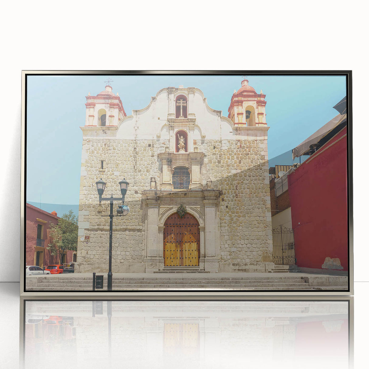 Mid-century modernist art of Oaxaca, Mexico scenery in silver-framed acrylic, featuring earthy tones.