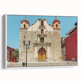 Vintage poster art of Oaxaca, Mexico on extra large framed canvas, featuring colorful art against a black background.
