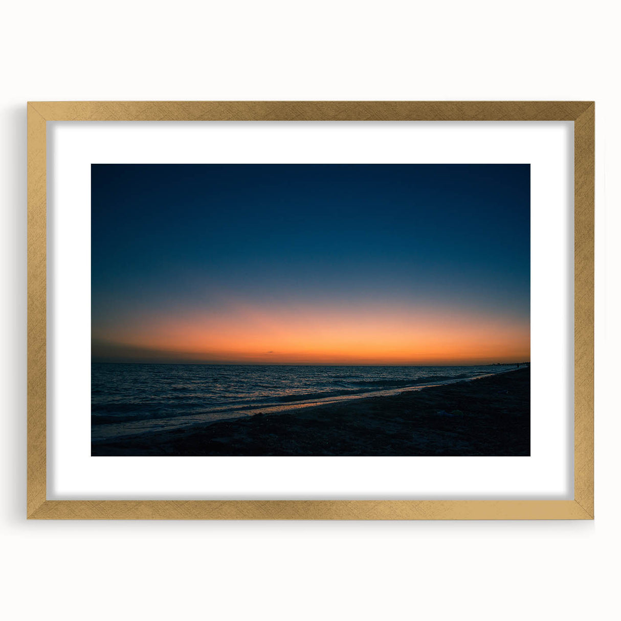 Extra large abstract art print of a Yucatán scenery in gold frame, featuring textured brush strokes in earth tones.