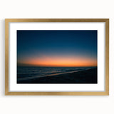 Extra large abstract art print of a Yucatán scenery in gold frame, featuring textured brush strokes in earth tones.