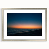 Textured abstract art print of Yucatan scenery in muted earth tones, framed in silver, ideal for bedroom decor.