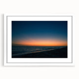 Abstract art print of Yucatán scenery in muted earth tones on a framed white mat, ideal for dining room decor.