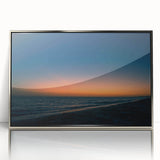 Mid-century modernist art depicting a Yucatan scenery in muted earth tones on a silver-framed acrylic.