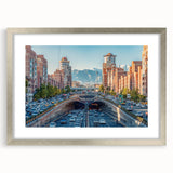 Textured abstract art print depicting a Middle Eastern scenery in muted earth tones, framed with a silver mat.