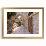 Extra large framed wall art depicting an abstract Jerusalem cityscape in textured gold and bronze tones.