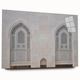 Large abstract wall art of Middle Eastern scenery in muted earth tones on acrylic glass.