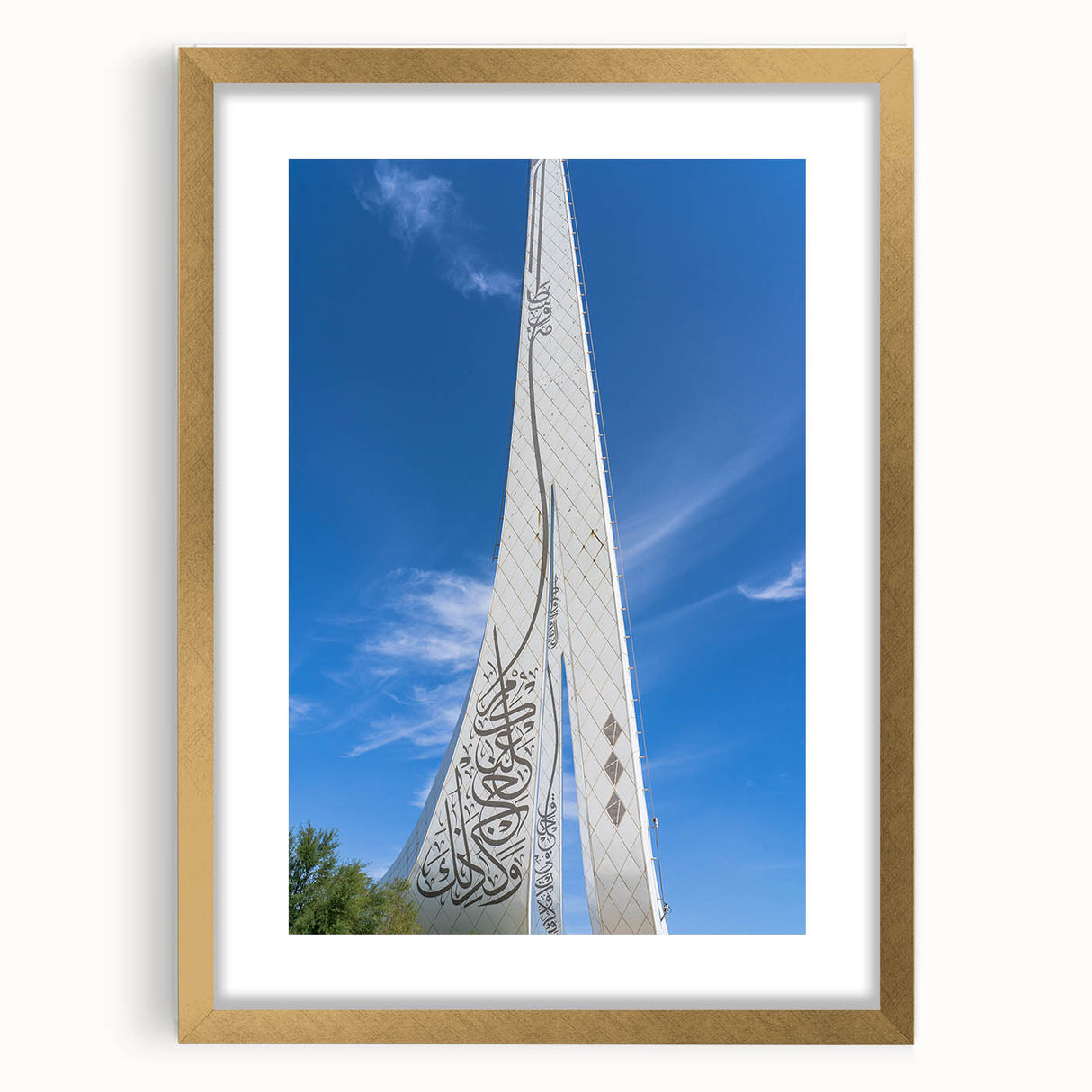 Extra large abstract art print featuring textured scenery of Qatar, in gold tones, framed with a mat.