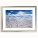 Textured abstract art print depicting a Bolivian landscape, in muted earth tones, framed in silver, suitable for bedroom art.