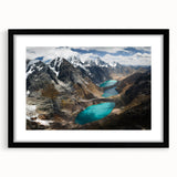 Abstract art print of a colorful South American landscape on textured canvas, framed in black, ideal for living room decor.