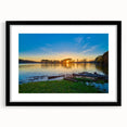 Abstract art print depicting colorful, textured scenery of Arkansas, framed in black, ideal for living room decor.