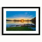Abstract art print depicting colorful, textured scenery of Arkansas, framed in black, ideal for living room decor.