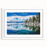 Abstract art print of Lake Tahoe in muted blue and green tones on a white framed canvas, ideal for dining room decor.