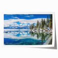 Extra large wall art of Lake Tahoe with muted blue and green tones on a rolled print, ideal for dining room decor.