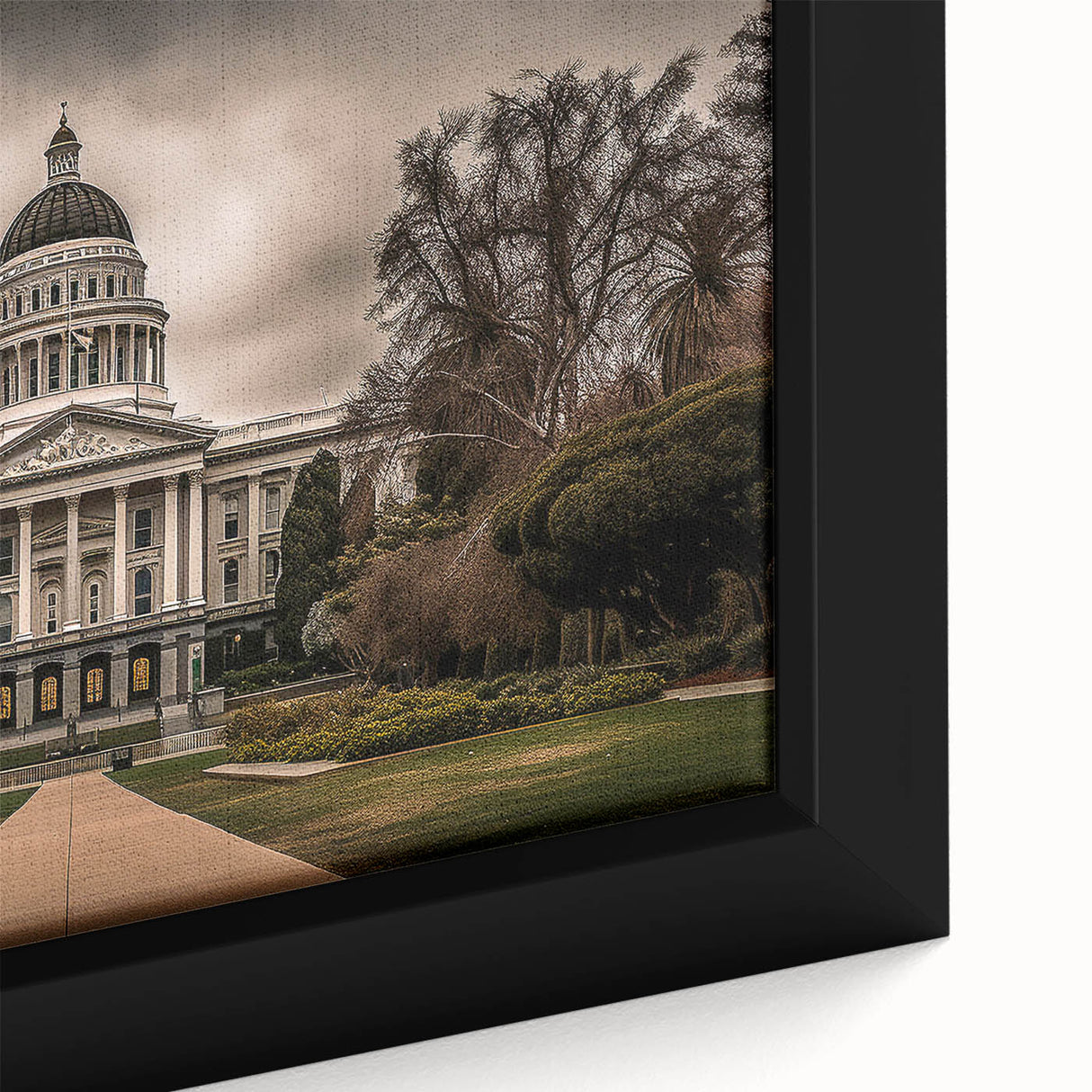 Framed canvas of a textured Sacramento skyline in black with colorful accents, ideal for large living room walls.