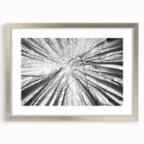 Textured abstract art print of Aspen, Colorado in muted earth tones on a silver-framed mat, ideal for bedroom decor.