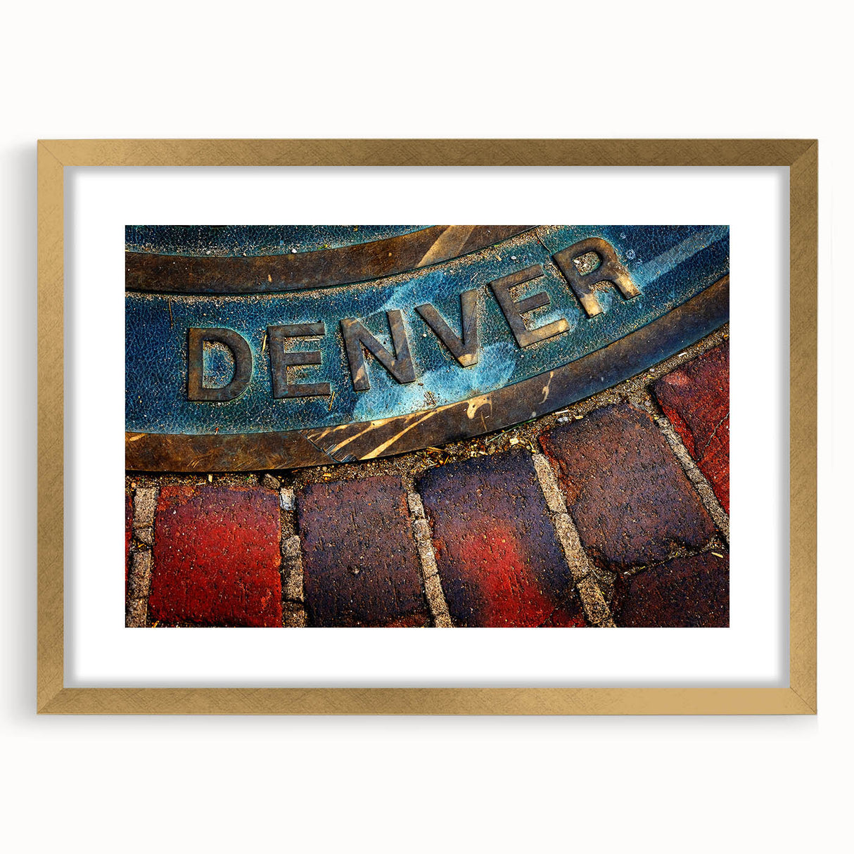 Extra large abstract art print of Denver scenery in gold frame, featuring textured blue and gray tones.