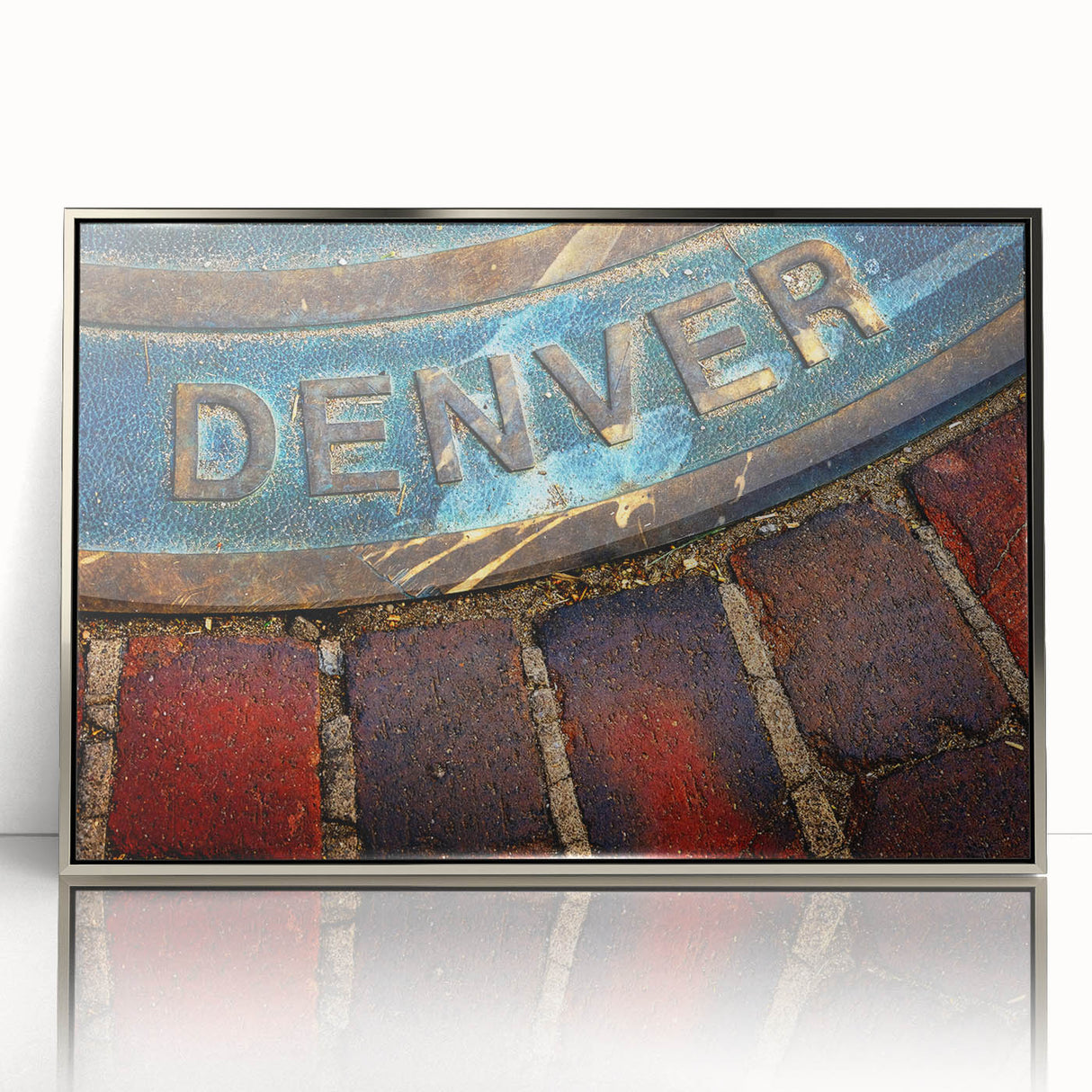 Mid-century modernist art depicting the Denver skyline in muted blue tones on a framed acrylic print.