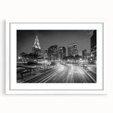 Abstract art print of a serene Connecticut landscape in soft blue and green tones on a framed white mat.