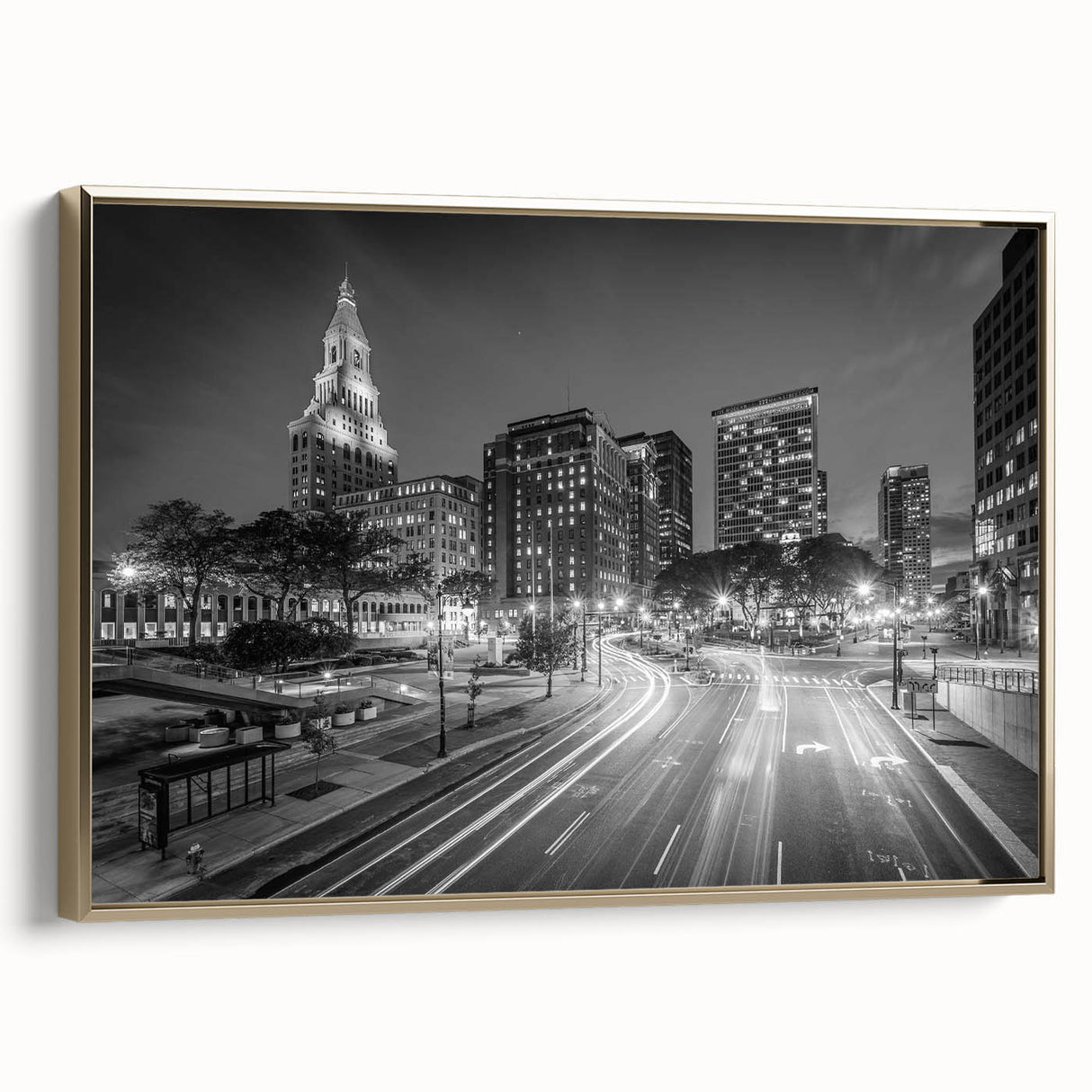 Framed canvas of a Connecticut landscape in vintage poster style, featuring black and gold tones.