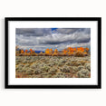 Abstract art print depicting vibrant, textured scenery of Idaho in a large black-framed mat, ideal for living room decor.