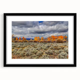 Abstract art print depicting vibrant, textured scenery of Idaho in a large black-framed mat, ideal for living room decor.