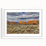 Abstract art print of an Idaho landscape in muted earth tones on a framed white mat, suitable for dining room decor.