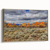 Framed canvas featuring a vintage-style landscape painting of Idaho scenery in muted earth tones.