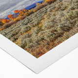 Art deco poster of a scenic Idaho landscape on rolled canvas, featuring muted earth tones, suitable for dining room wall art.