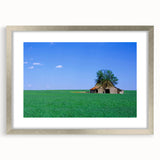 Textured abstract art print depicting a soft-hued Kentucky landscape on a silver-framed mat, suitable for bedroom art.
