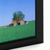 Close-up of a textured black wall art depicting a colorful Kentucky landscape on a framed canvas.