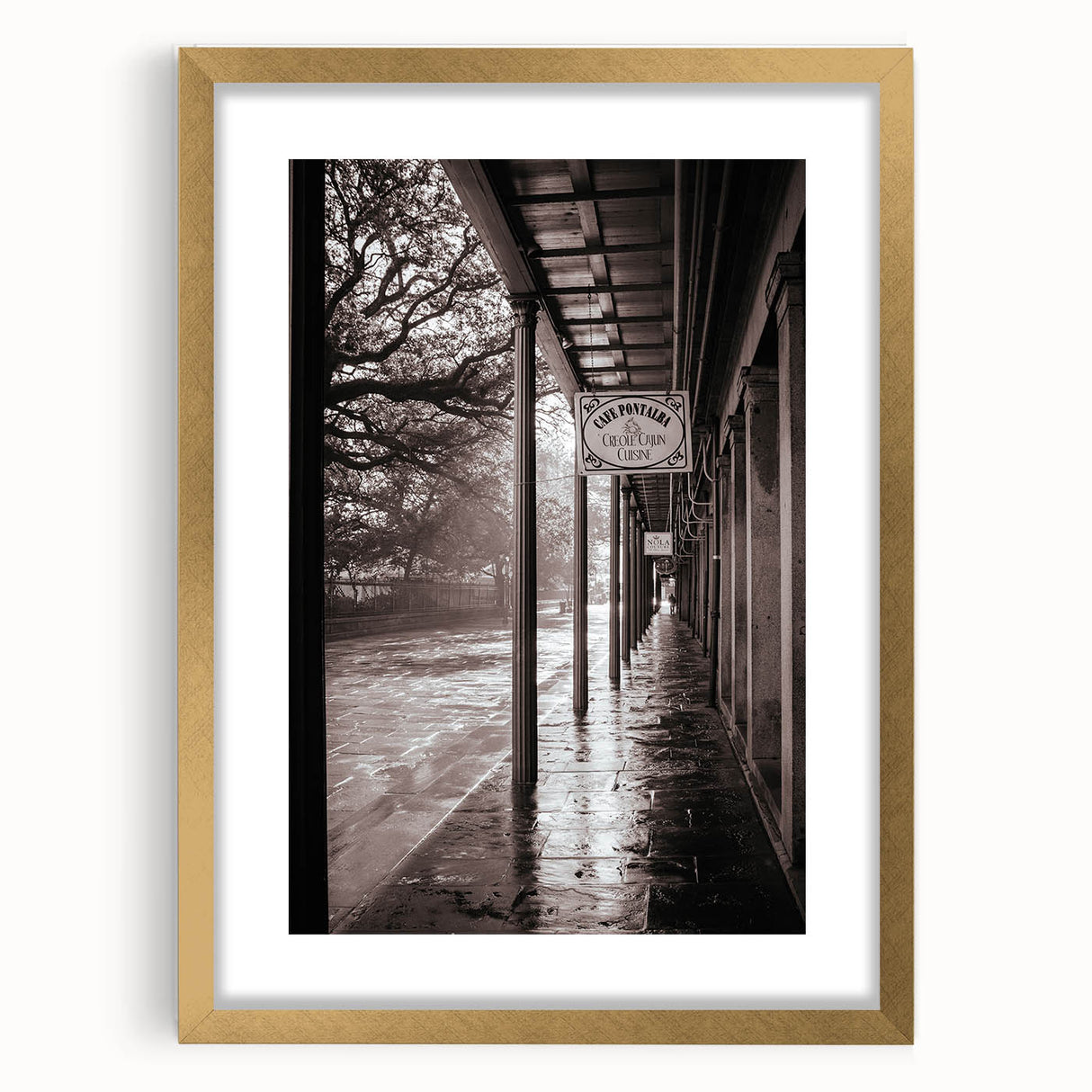 Abstract art print of a New Orleans scenery in gold frame with mat, featuring textured blue and gray tones.