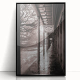 Large abstract wall art depicting a stylized New Orleans scene in muted earth tones, framed in black acrylic.