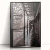 Mid-century modernist art depicting a New Orleans street scene in muted earth tones on a silver-framed acrylic print.