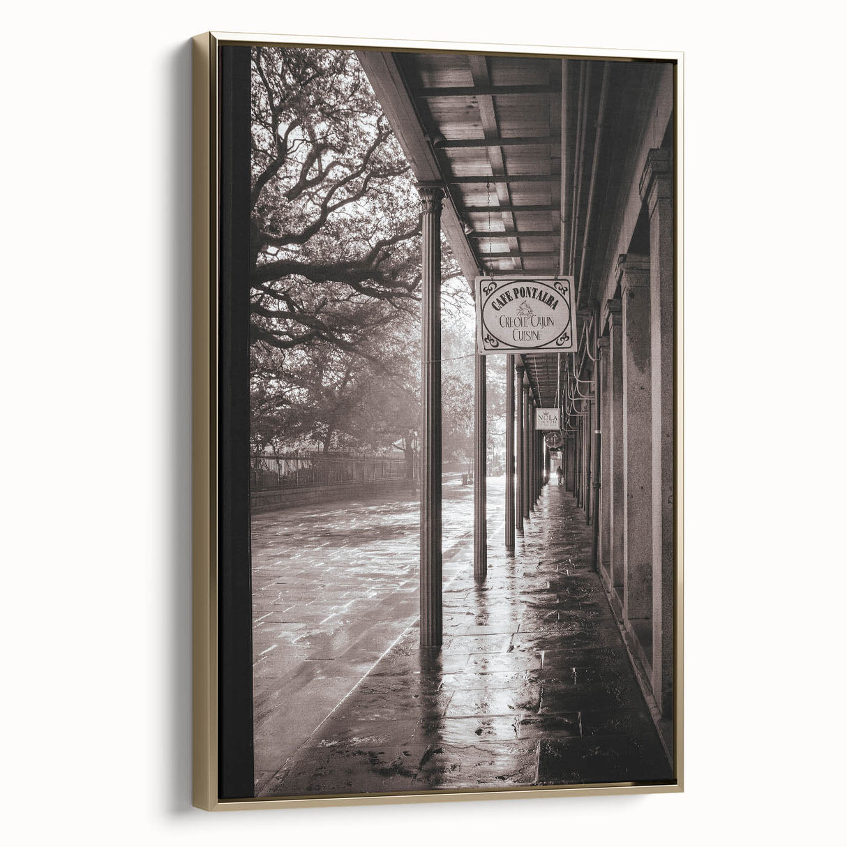 Framed canvas of a vintage-style New Orleans landscape in black and gold tones, ideal for bedroom wall art.