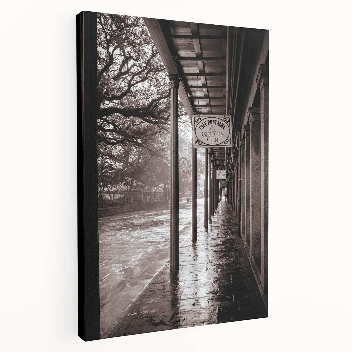 Side view of a stretched canvas depicting a vibrant New Orleans street scene, ideal for kitchen wall art.