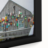 Extra large framed canvas featuring a textured depiction of Maine scenery in black with vibrant color accents.