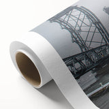 Art deco poster of Maine scenery on rolled canvas, featuring muted blue and green tones, ideal for nursery wall art.