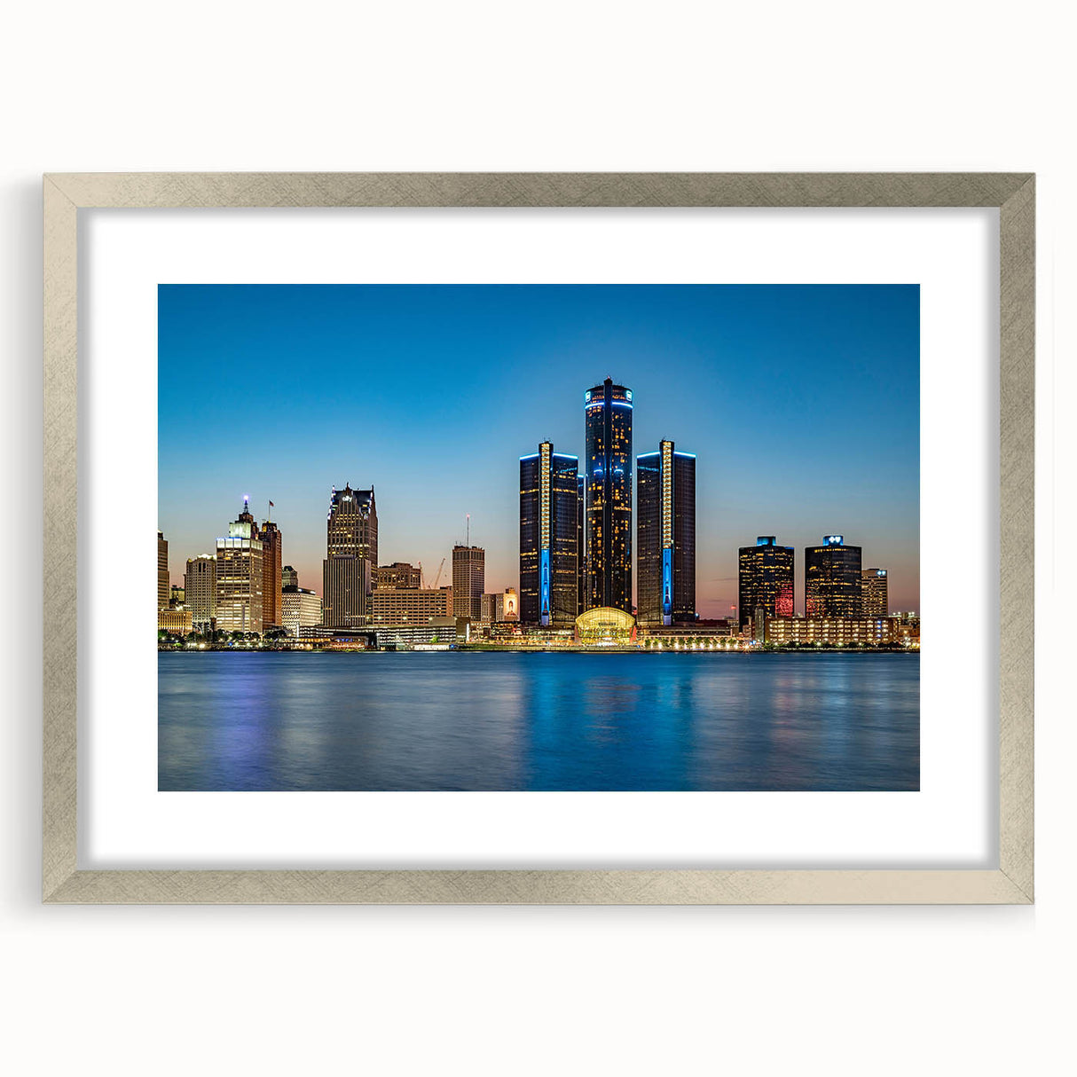 Textured abstract art print of Detroit skyline in muted silver and gray, framed with a silver mat, ideal for bedroom art.