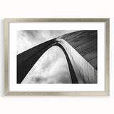 Textured art print of St. Louis skyline in muted blue and gray tones on a framed silver mat, ideal for bedroom wall decor.