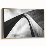 Framed canvas of St. Louis skyline in vintage poster style, with muted gold and black tones, ideal for bedroom wall art.