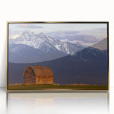 Large art print of a Montana landscape in muted earth tones on acrylic, framed in gold, suitable for modern art wall decor.